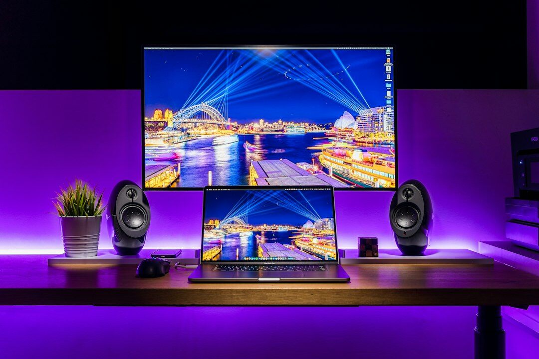 Sound engineer editing audio waveforms on a computer screen